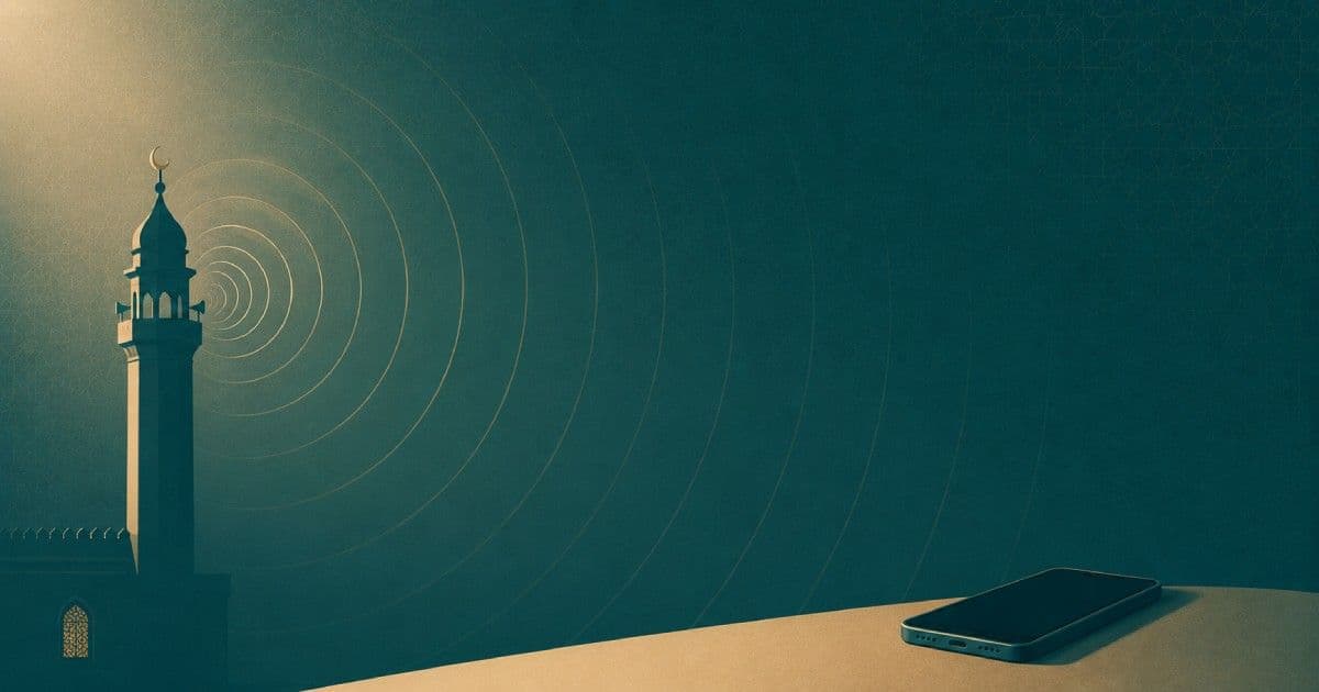 A minaret with fading sound rings spreading toward a phone lying face up on a table with a dark screen