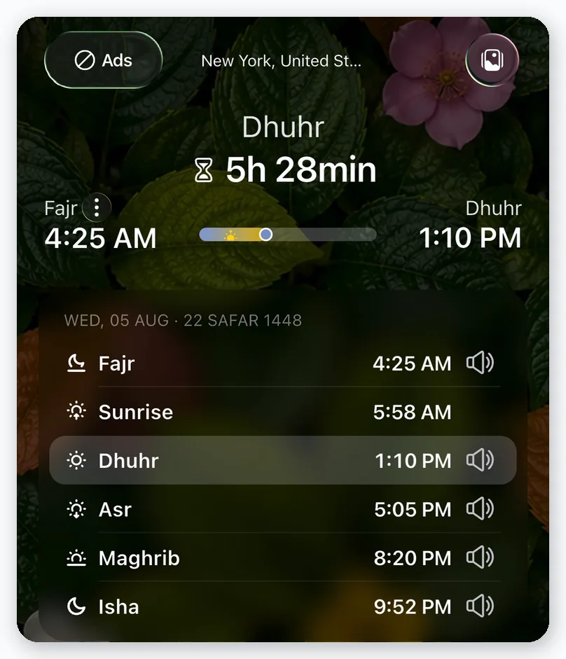 The Home screen with the Nature theme applied: dark green leaves and a pink flower behind the countdown and the day's prayer times.